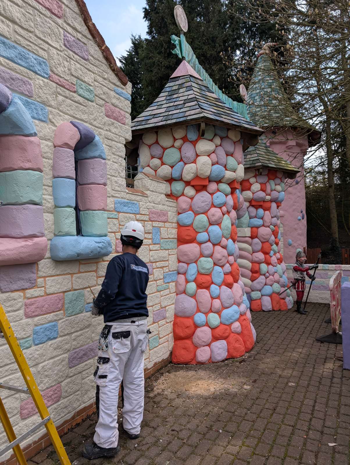 Close up of the paintwork at the refurbishment of Lollipoppet Castle at Sundown Adventureland is underway